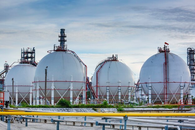White spherical propane tanks containing fuel gas pipeline.