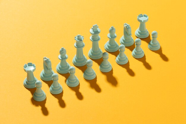 White team chess on yellow background