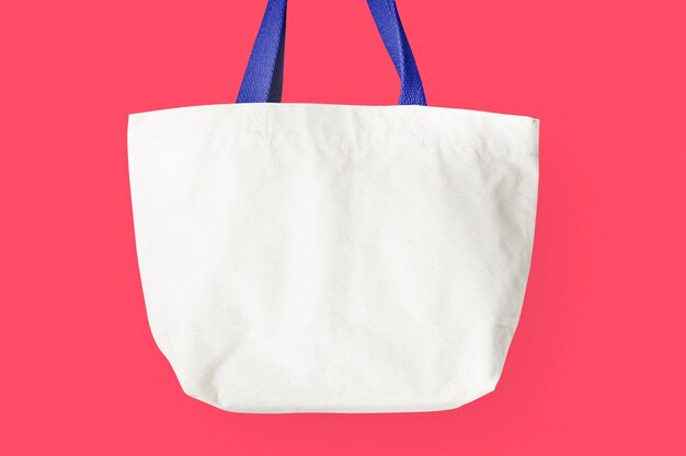 White tote bag on pink background