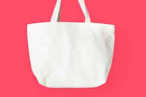 Free photo white tote bag on pink background
