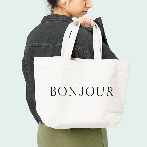 White tote bag with bonjour typography accessory studio shoot