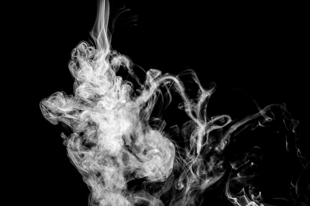 Free photo white wavy smoke on black background