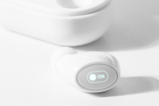 White wireless earbuds with case