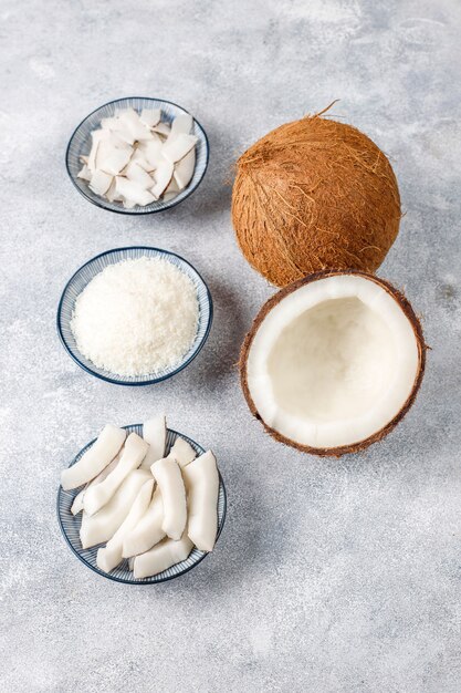 whole coconut and various pieces of coconut