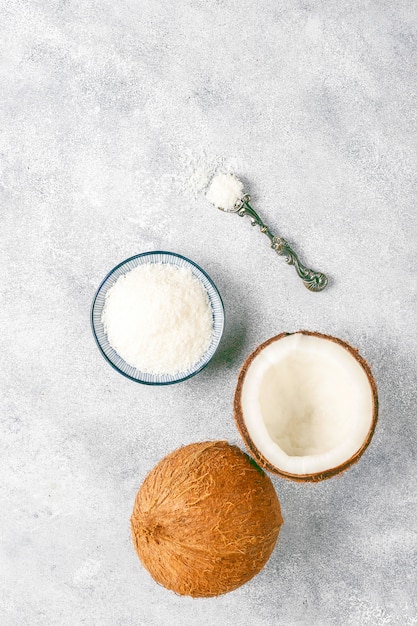 Whole coconut and various pieces of coconut