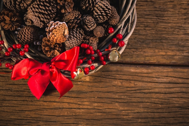 Free photo wicker basket with pine cones