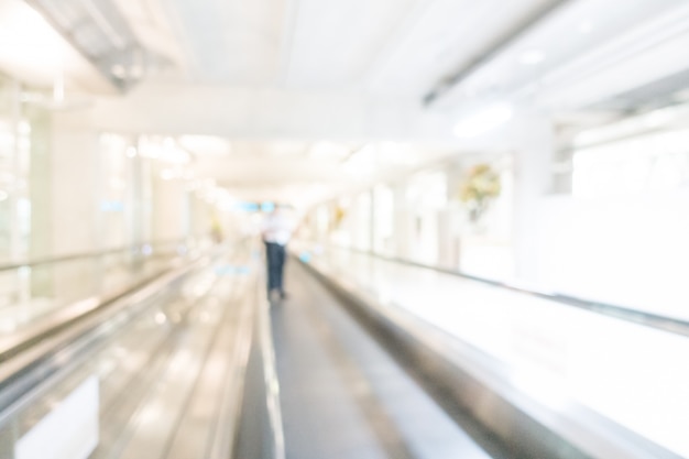 Wide corridor of blurred airport