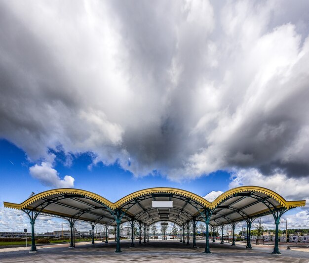 Wide shot of a covered events space in the netherlands on a cloudy day