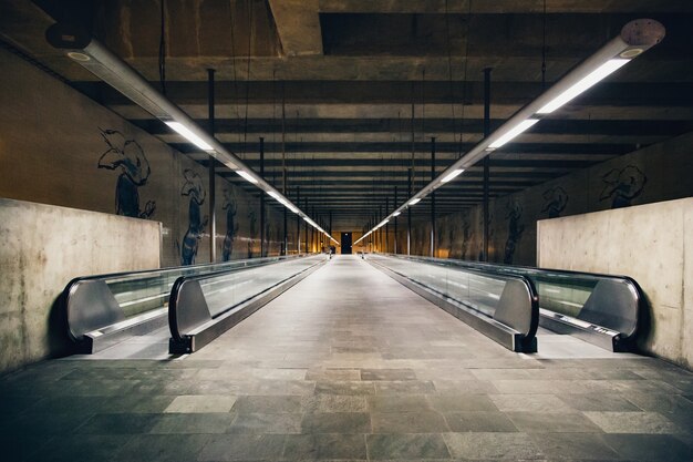 Wide shot of moving walkways or autowalks