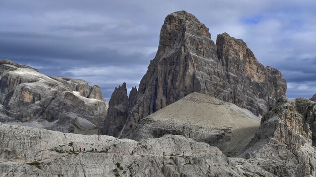 Wide shot of rocky cliffs under a blue sky