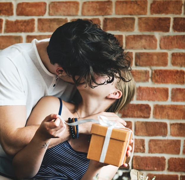 Wife receives a gift box from her husband