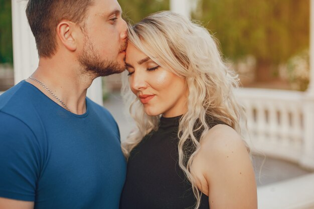 Wife with her husband in a summer park