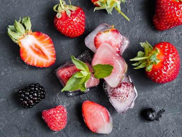 Wild berries in ice cubes