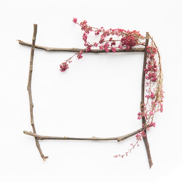 Wild flowers on frame from twigs