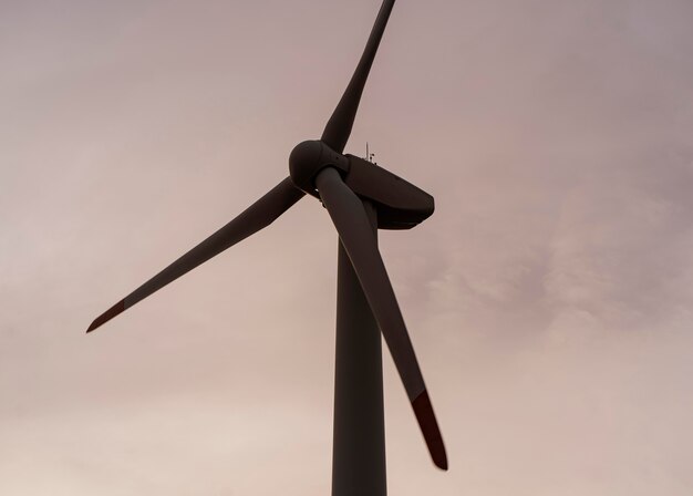 Wind turbine silhouette generating electricity