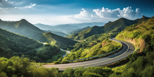 Free photo winding road cuts a path through lush green mountains under a hazy sky