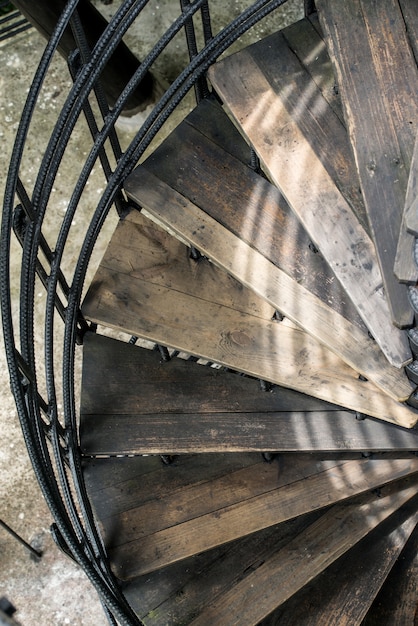 Free photo winding stairs with old wood