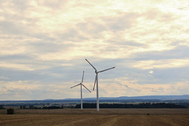 "Windmills in fields"