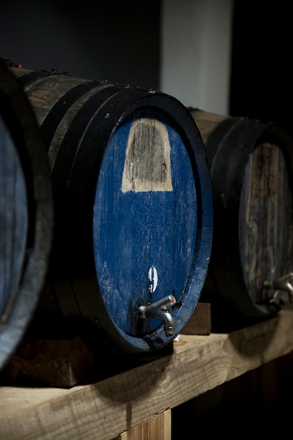 Wine cellar with old wine barrels assortment