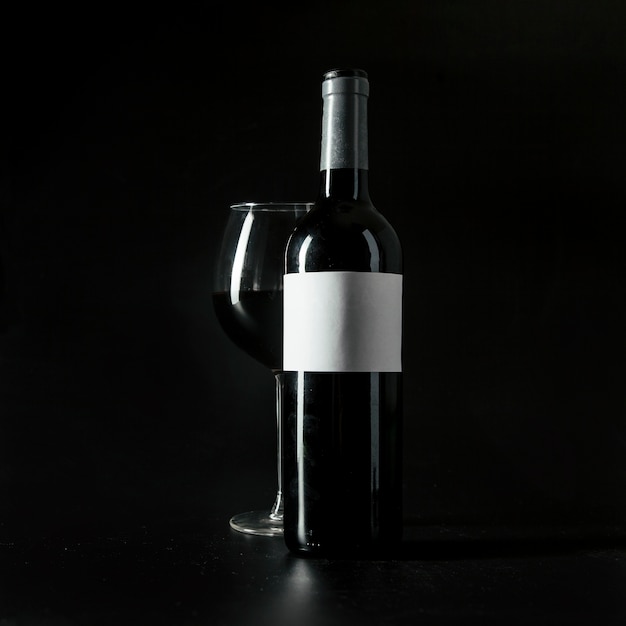 Wineglass near bottle