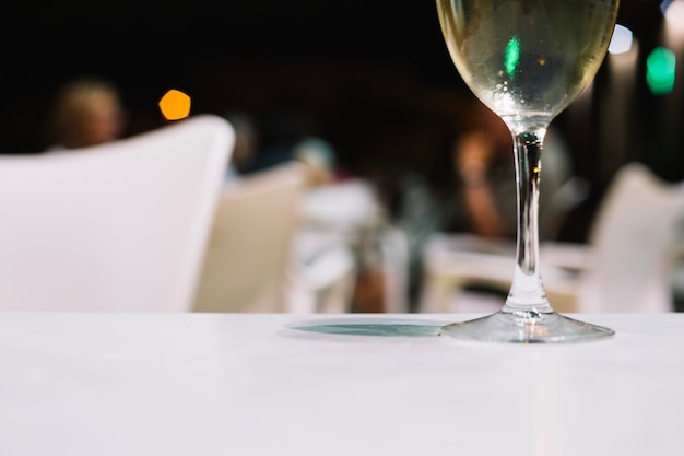 Wineglass on restaurant table