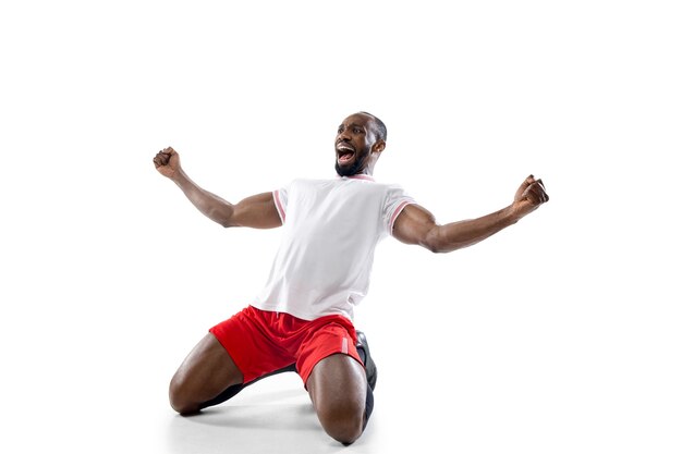 Winner. Funny emotions of professional soccer player isolated on white studio background. Excitement in game, human emotions, facial expression and passion with sport concept.