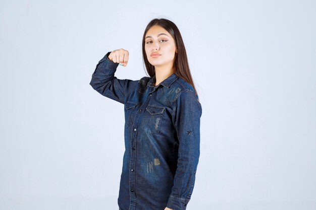 The winner Young woman showing her fists and feeling powerful