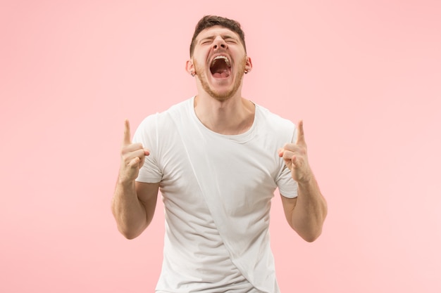 Free photo winning success happy man celebrating being a winner.