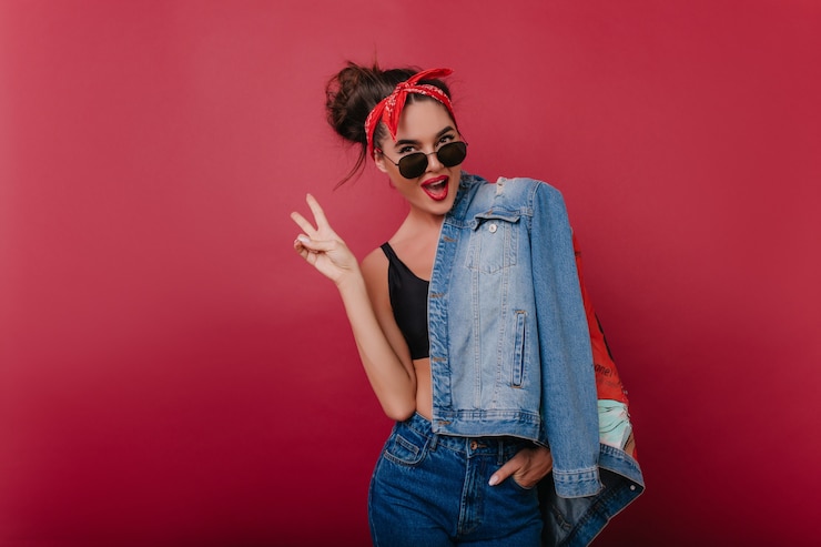 Free Photo winsome trendy lady in stylish sunglasses having fun during indoor photoshoot