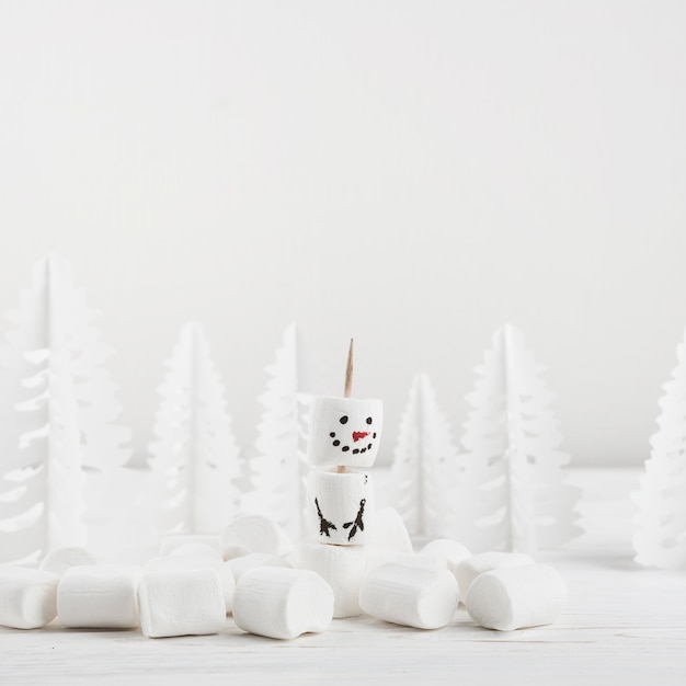 Free photo winter composition of marshmallow showman