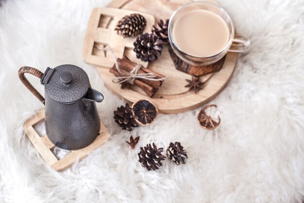 winter still life with cones and hot drink