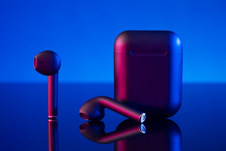 Free Photo wireless earbuds with neon cyberpunk style lighting