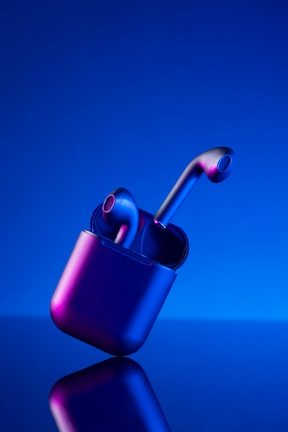 Wireless earbuds with neon cyberpunk style lighting