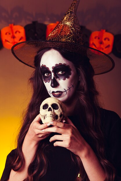 Witch with skull