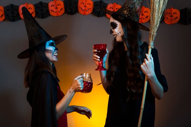 Witches drinking at a party
