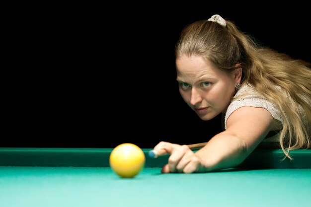 Woma playing billiards