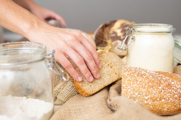 Woman arranging wholegrain toasts