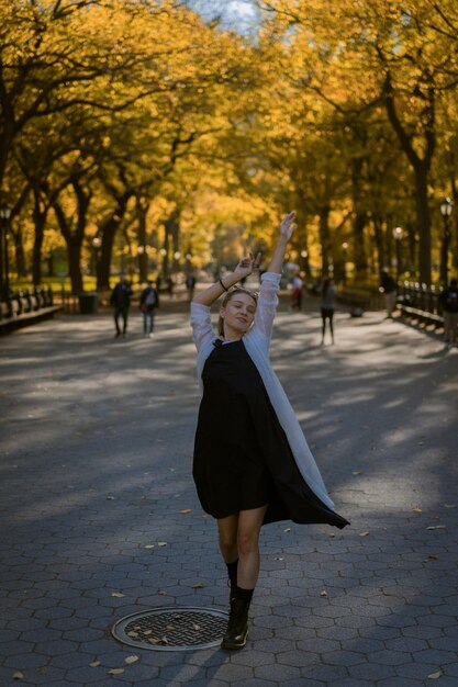 woman in autumn park in new york