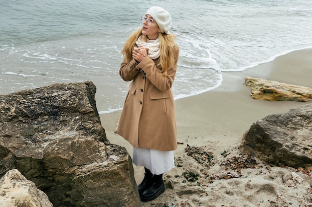 Woman at the beach during winter