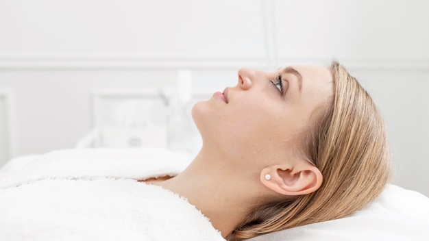 Woman at beauty clinic for treatment