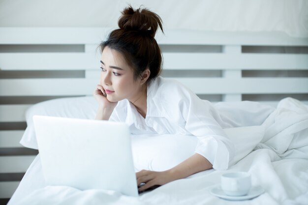 woman on the bed in the house