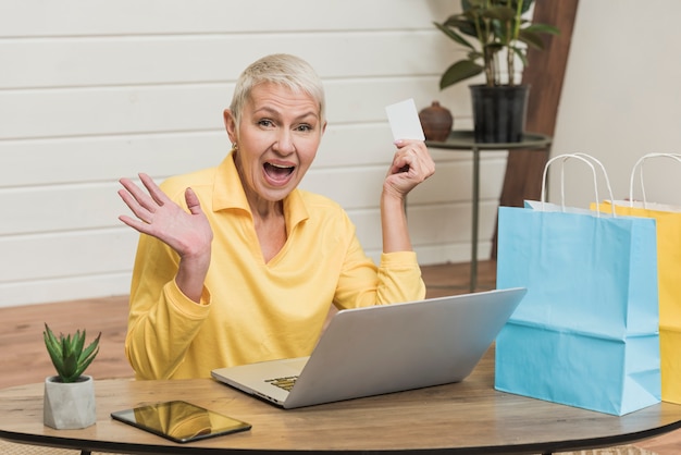Woman being excited by special offers on the internet