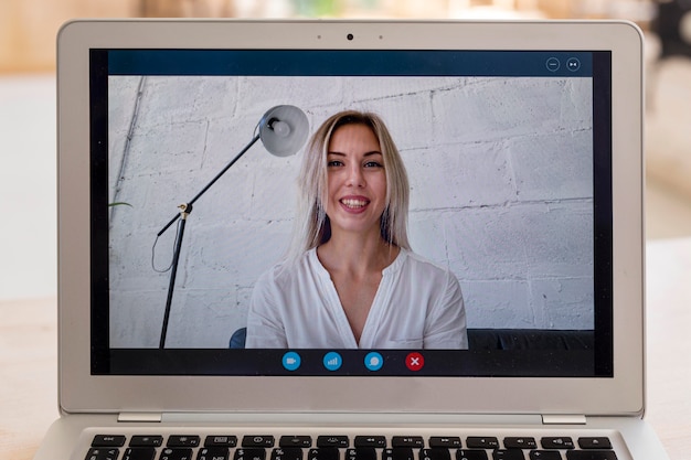 Woman being in an online meeting