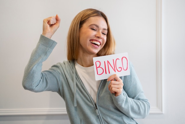 Woman being passionate about playing bingo