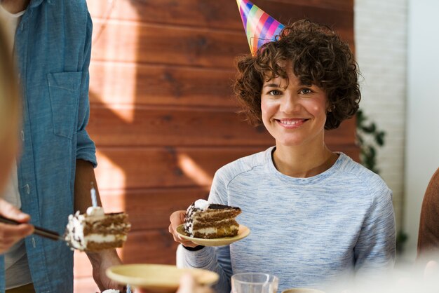 Free photo woman at birthday party