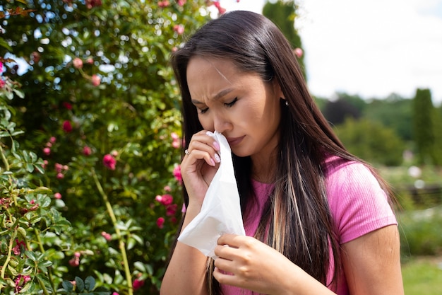 Woman blowing her nose medium shot