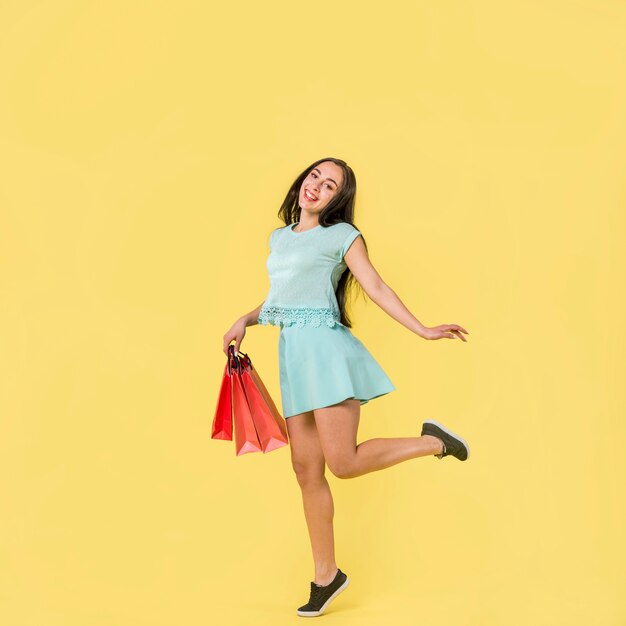 Woman in blue clothes standing on sock  