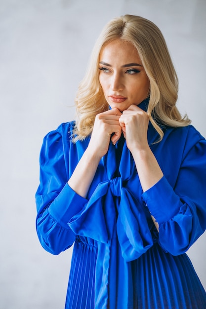 Free photo woman in blue dress