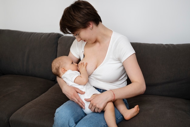 Woman breast feeding her child