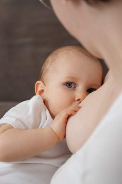 Woman breast feeding her child